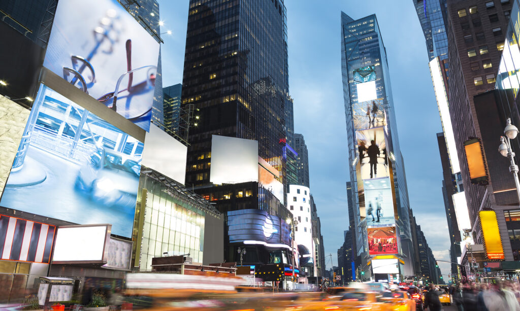 Branding and mergers depicted metaphorically in New York's Times Square.