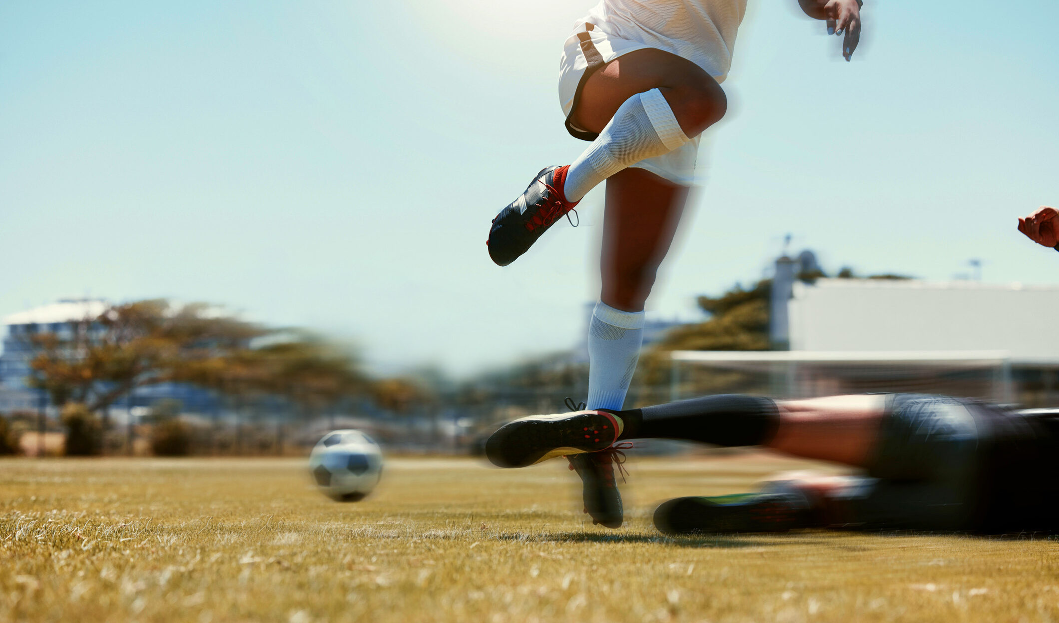 Football, game and women soccer trip busy with sport training, exercise and workout. Fitness, athlete energy and strong cardio sports of a fast female team in a competition together for teamwork